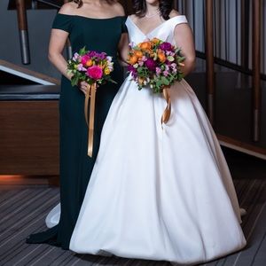 Dress is in “lagoon”. Worn once.